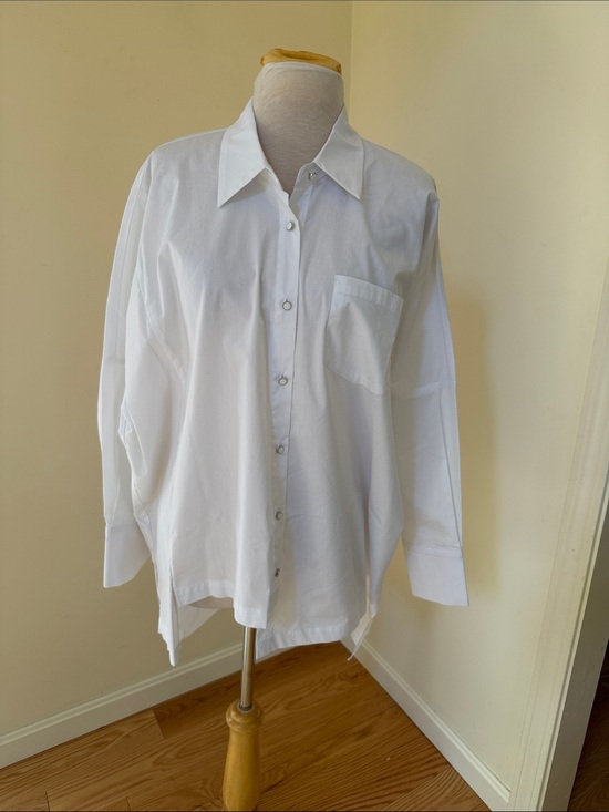 A.Z.I Tops - New! A.Z.I white large asymmetrical back crossover top.